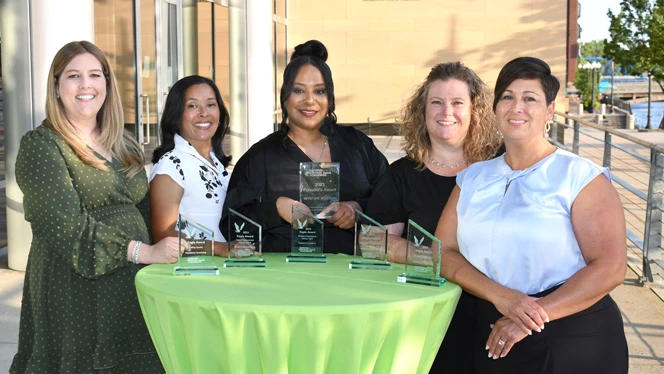 Leadership Team with Award