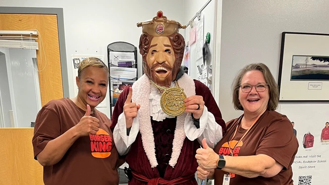 Cummings with school staff
