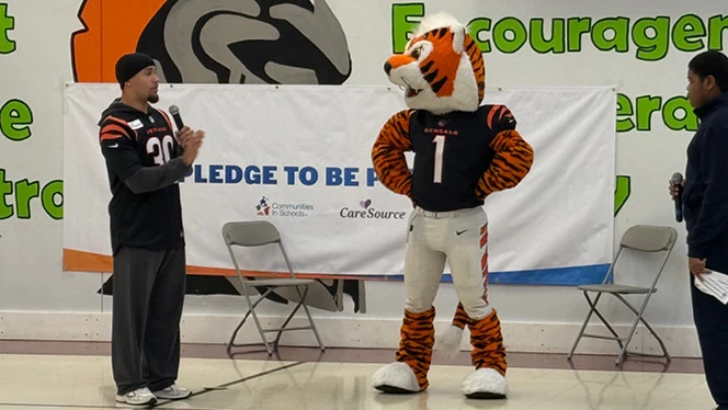 K-8 School in Cincinnati: Alliance Academy students get a visit from Cincinnati Bengals star Chase Brown for a talk about attendance.