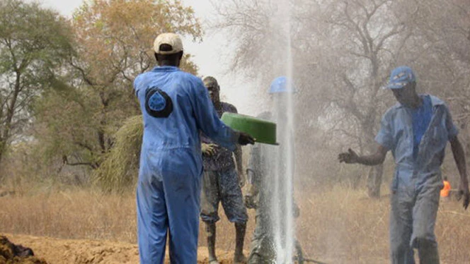 Sudanese people collecting water. Sudanese people collecting water.