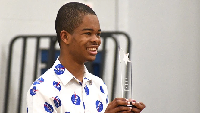 K-8 School in Grand Rapids: Ridge Park student, Designer James, took second place at local civics bee.