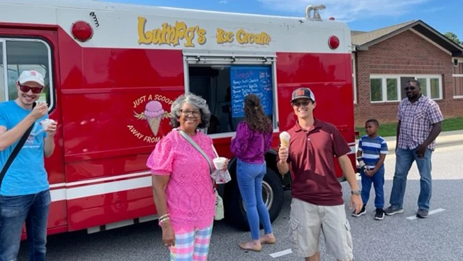People enjoying ice cream. People enjoying ice cream.