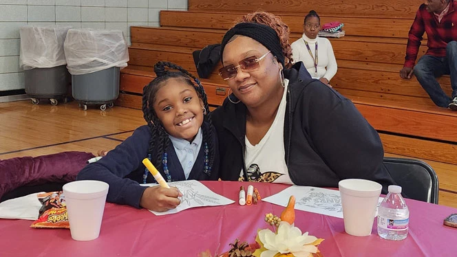 K-8 School in Detroit: Warrendale students host Gratitude Luncheon for families.