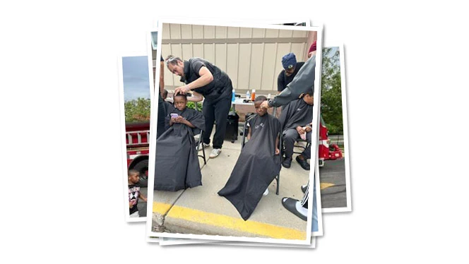 K-8 School in Milwaukee WI: Students get haircuts at the back to school bash event.