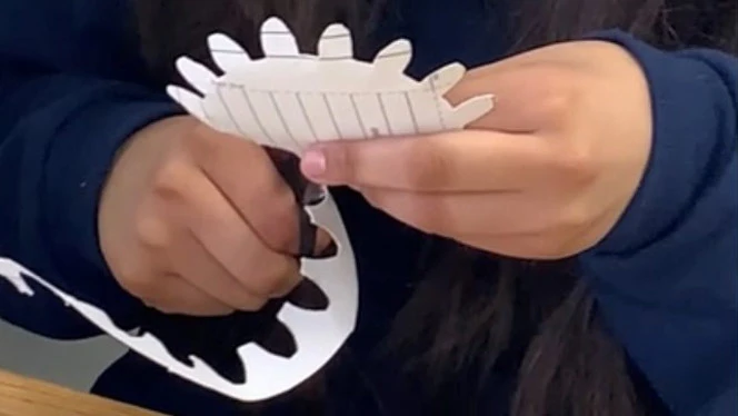 A child working with arts and crafts. A child working with arts and crafts.