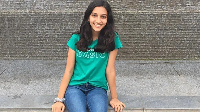 Anya Joshi smiling. Anya Joshi smiling.