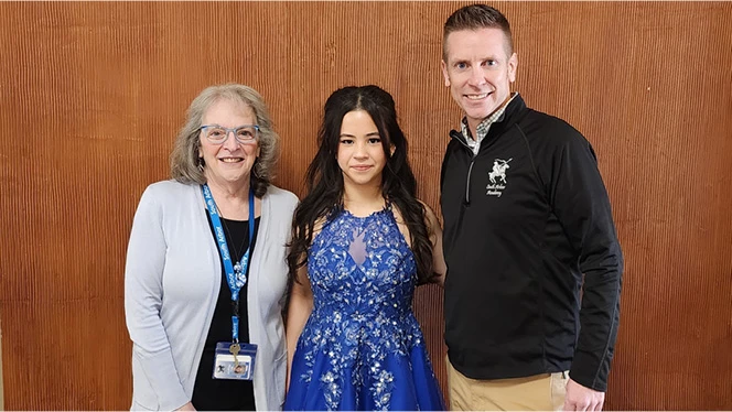 K-8 School in Ypsilanti: Former South Arbor student Selah Dowell poses with former teachers.