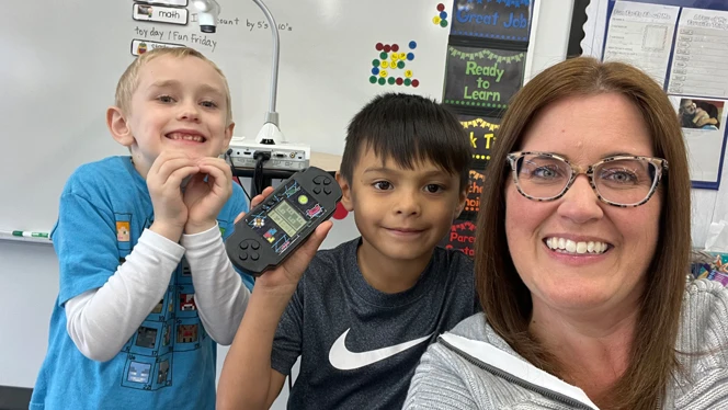 Ms Heneveld with her students. Ms Heneveld with her students.