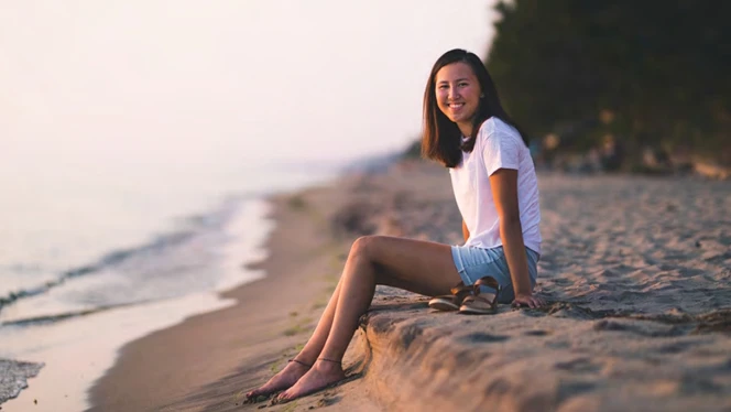 Kylie Flynn on a beach.