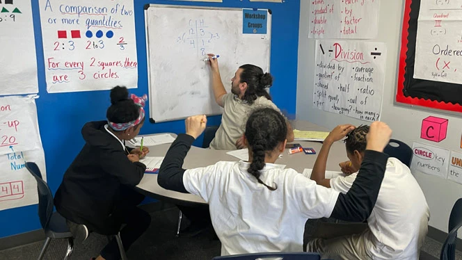 Treu teaching math at Buffalo United Charter School