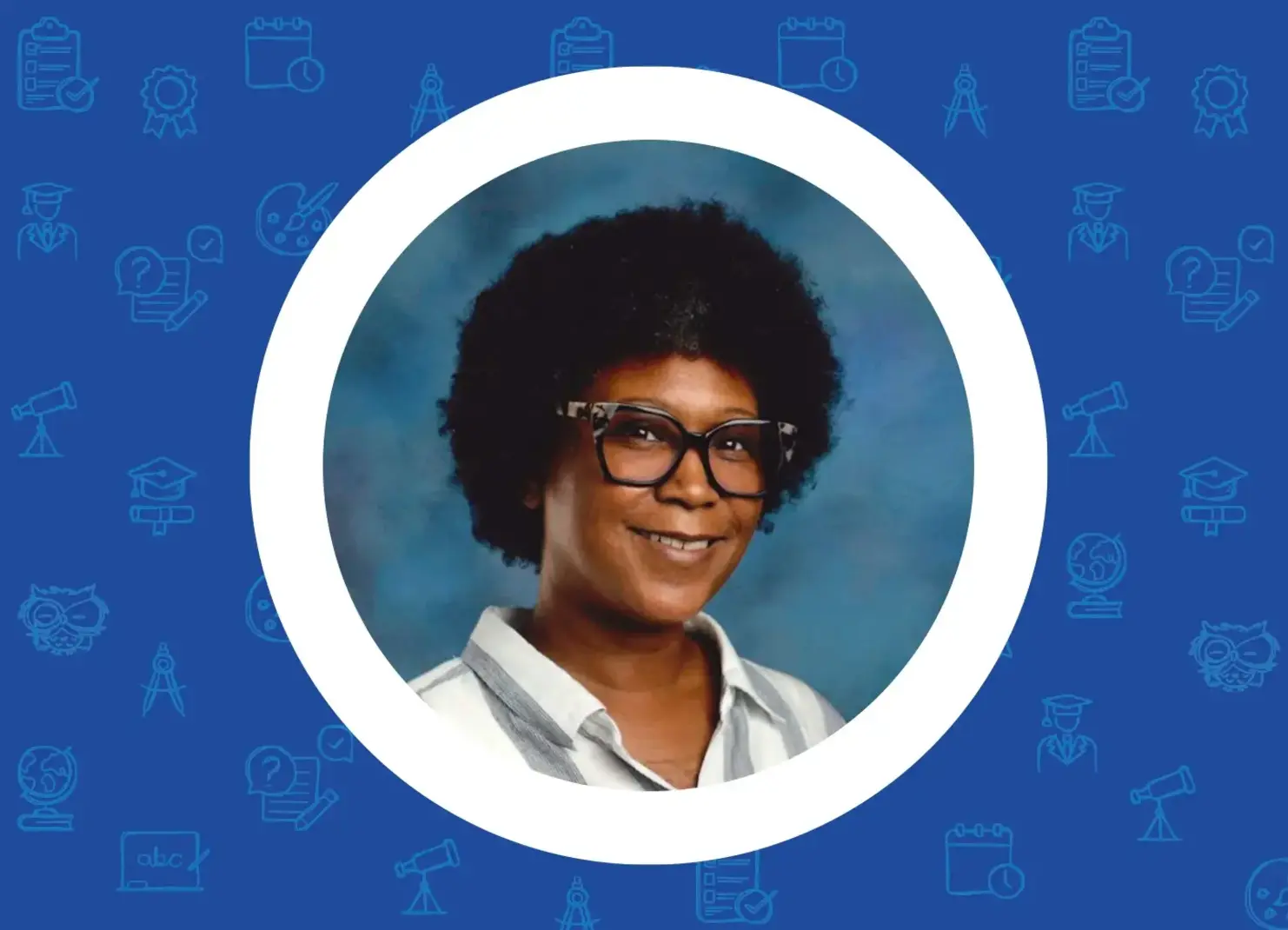 a woman wearing glasses and smiling
