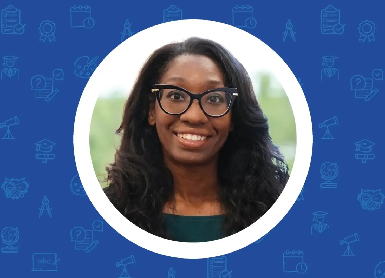 a woman wearing glasses and smiling