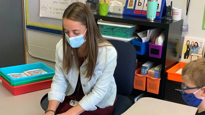 A teacher talking to a student. A teacher talking to a student.
