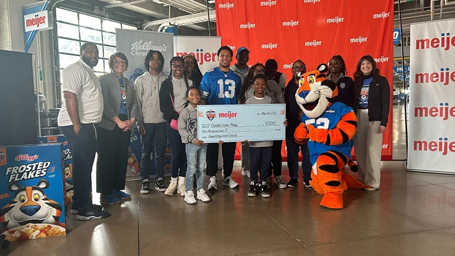 K-12 School in Center Line: Center Line and Great Oaks accept a donation towards middle school athletics.