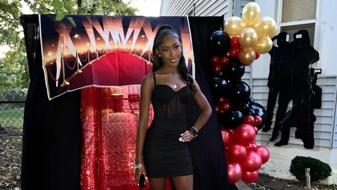 Curry posing with backdrop