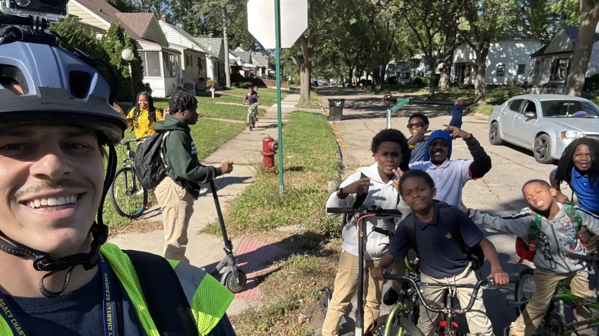 a group of people on bicycles and scooters