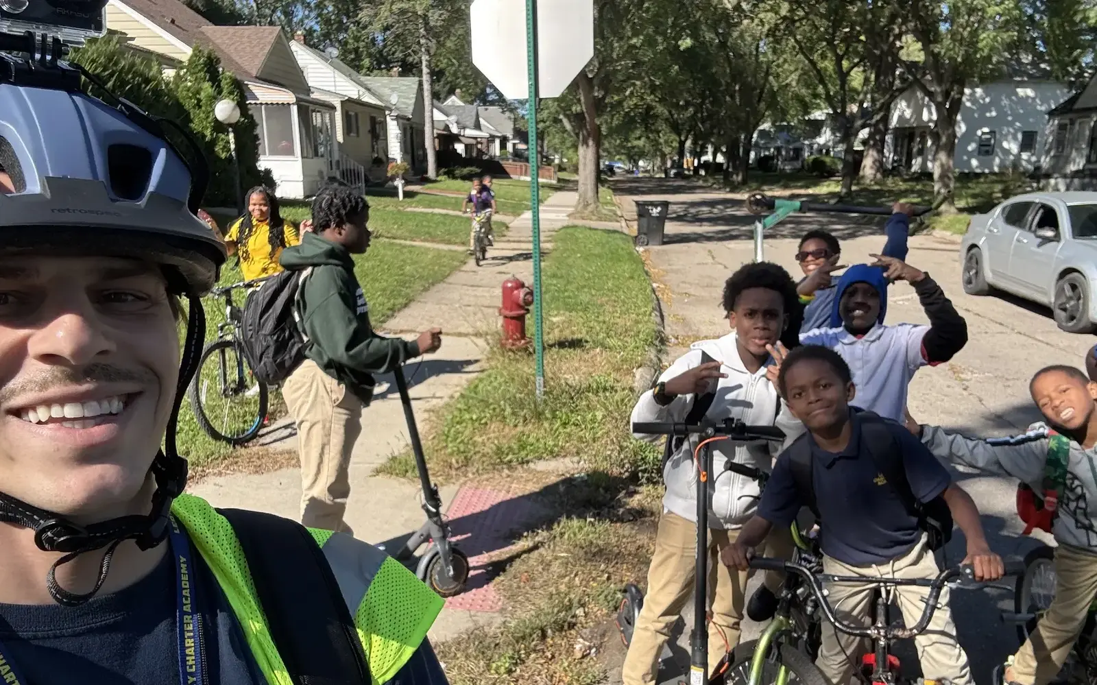 a group of people on bicycles and scooters