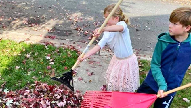 Children raking leaves Children raking leaves