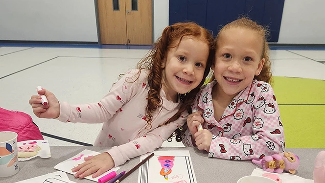 K-9 School in Watkins: Sky Ranch Academy hosts its first Literacy Night.
