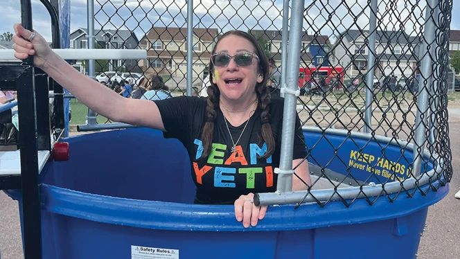 K-8 School in Colorado Springs: Mountain View Academy families dunk teachers during Yeti For Summer.