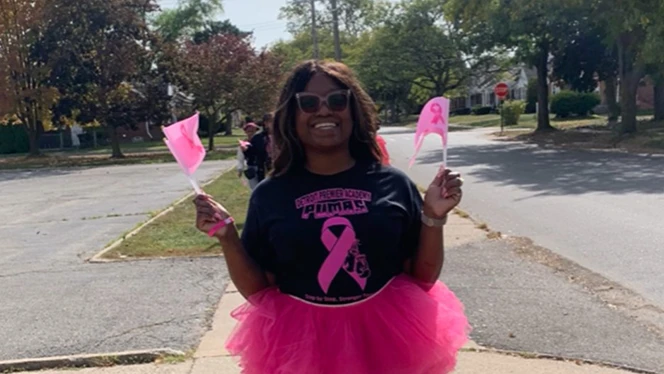 K-8 School in Detroit: Detroit Premier students, families, and staff participate in Breast Cancer Awareness walk.