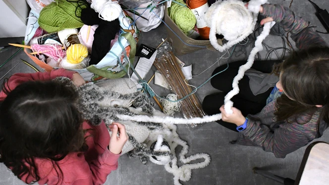 students looking for yarn