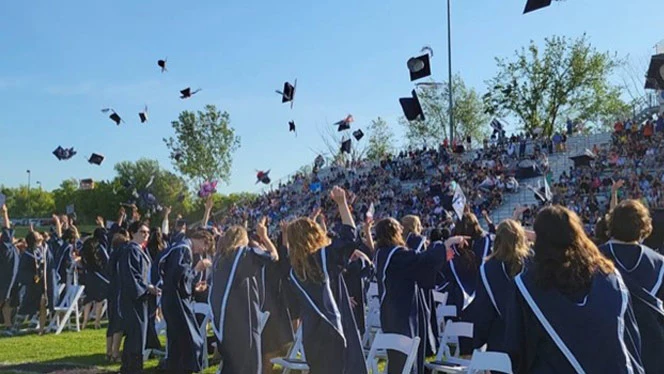 students celebrate graduation
