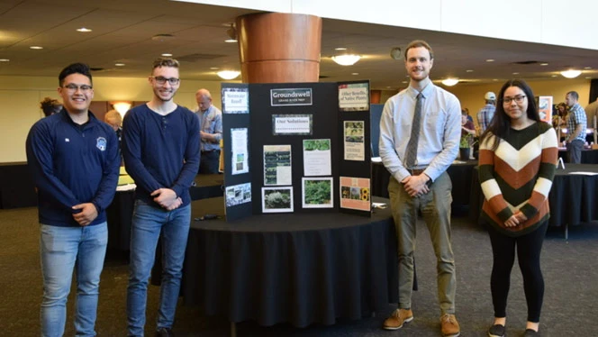 Jordan Dischinger-Smedes with students