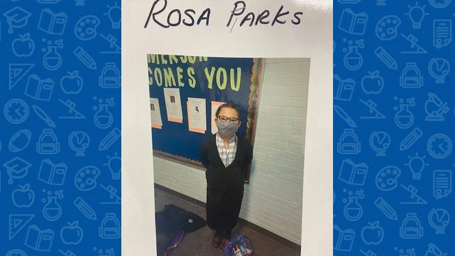 Child dressed up in nice clothes.