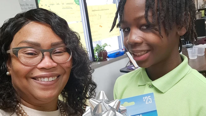 Lisa Jackson-Clayborn and student.