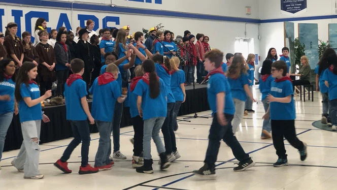 Students sing "Michigan Gals"