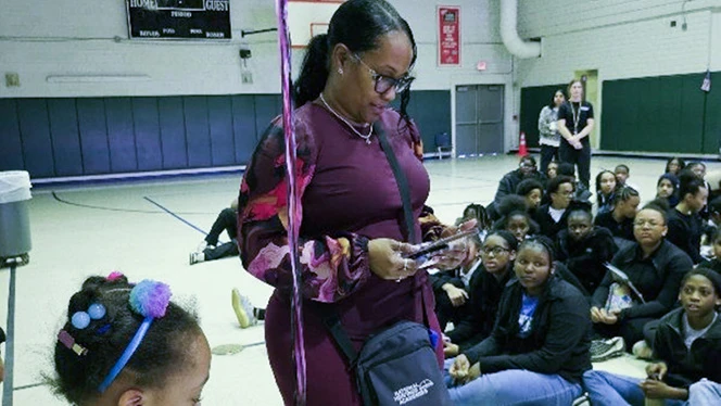 K-8 School in Warren: Great Oaks Dean Yevrah Johnson wins Dean of Excellence award.