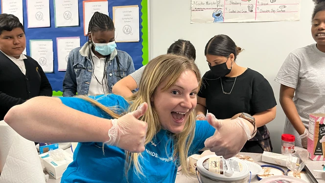 Student giving thumbs up