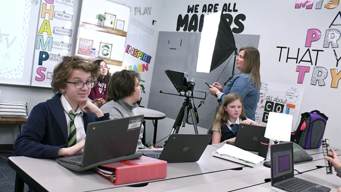 Students working on the broadcast. Students working on the broadcast.