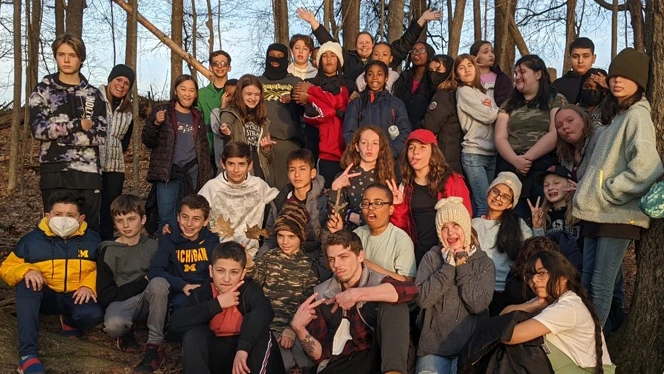 Students posing outside at camp. Students posing outside at camp.