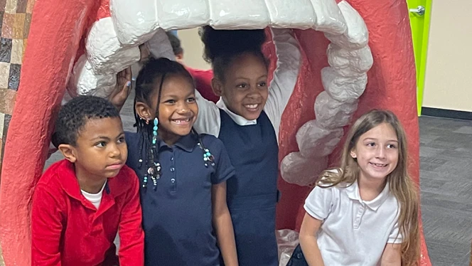 Students exploring exhibit
