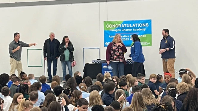 Irvin and Knapp at award assembly.