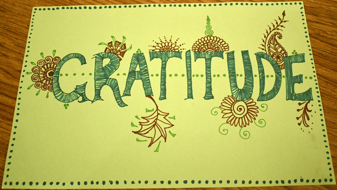 Hand drawn sign that says, Gratitude.