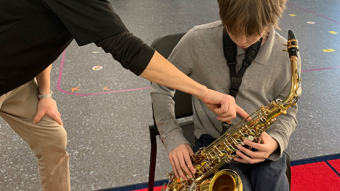 Student with saxophone