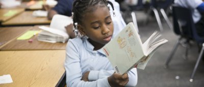 Student reading a book