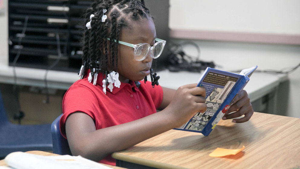 Student reading a book