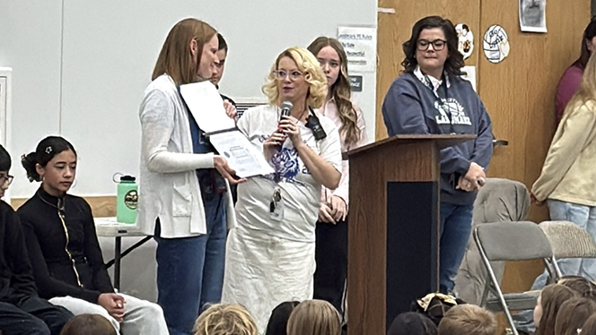 K-8 School in Commerce City: Landmark Academy at Reunion principal is awarded the Patriotic Employer Award.