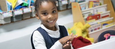 Student playing with Play-Doh