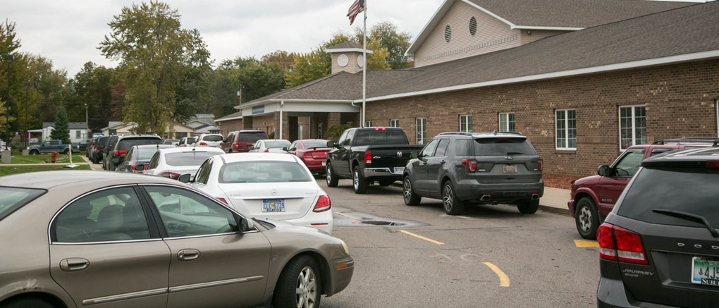 Vehicles in front of school