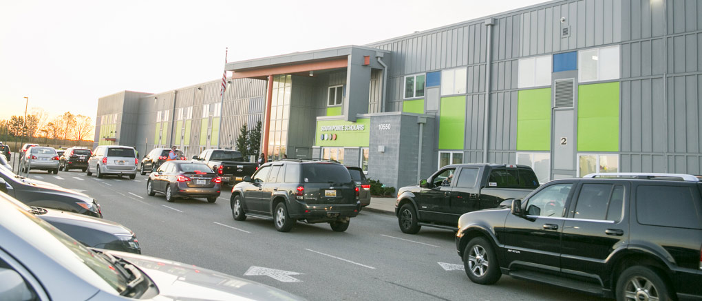 Vehicles in front of school