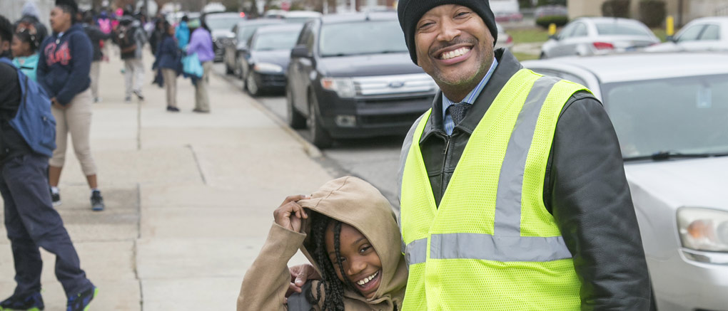 Greeting students at drop off time