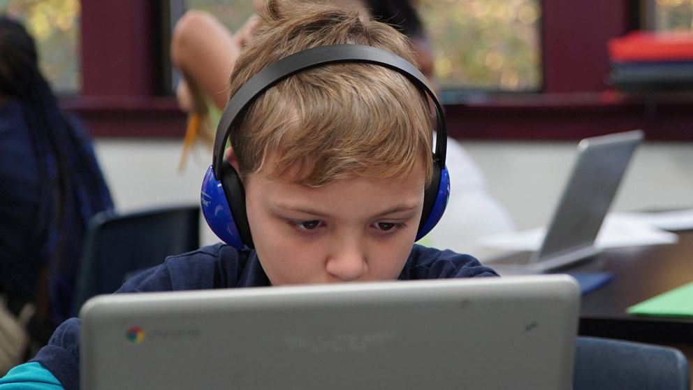 Student Works on a Paper