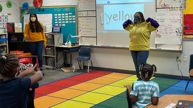 Teachers wearing yellow.