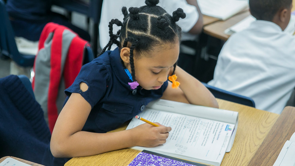 Student Works on a Paper