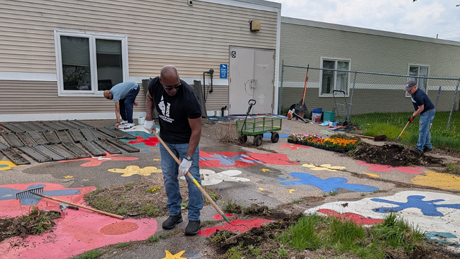 K-12 Schools in Grand Rapids: NHA Service Center employees volunteer at two local NHA schools for Earth Day.